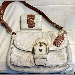 Coach cream/brown mid sized leather purse and matching wallet.